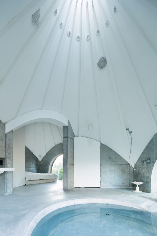 Teepee-shaped Jikka complex by Issei Suma features community kitchen and spiral-shaped pool
