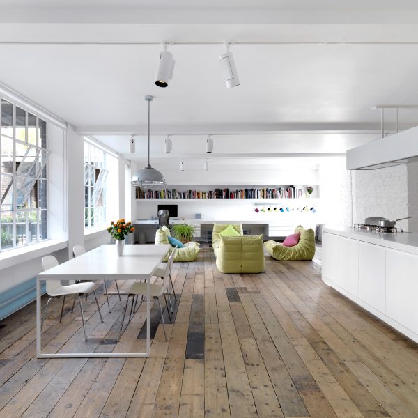 Old timber floorboards from a chapel are used in this warehouse conversion by Form Design Architecture