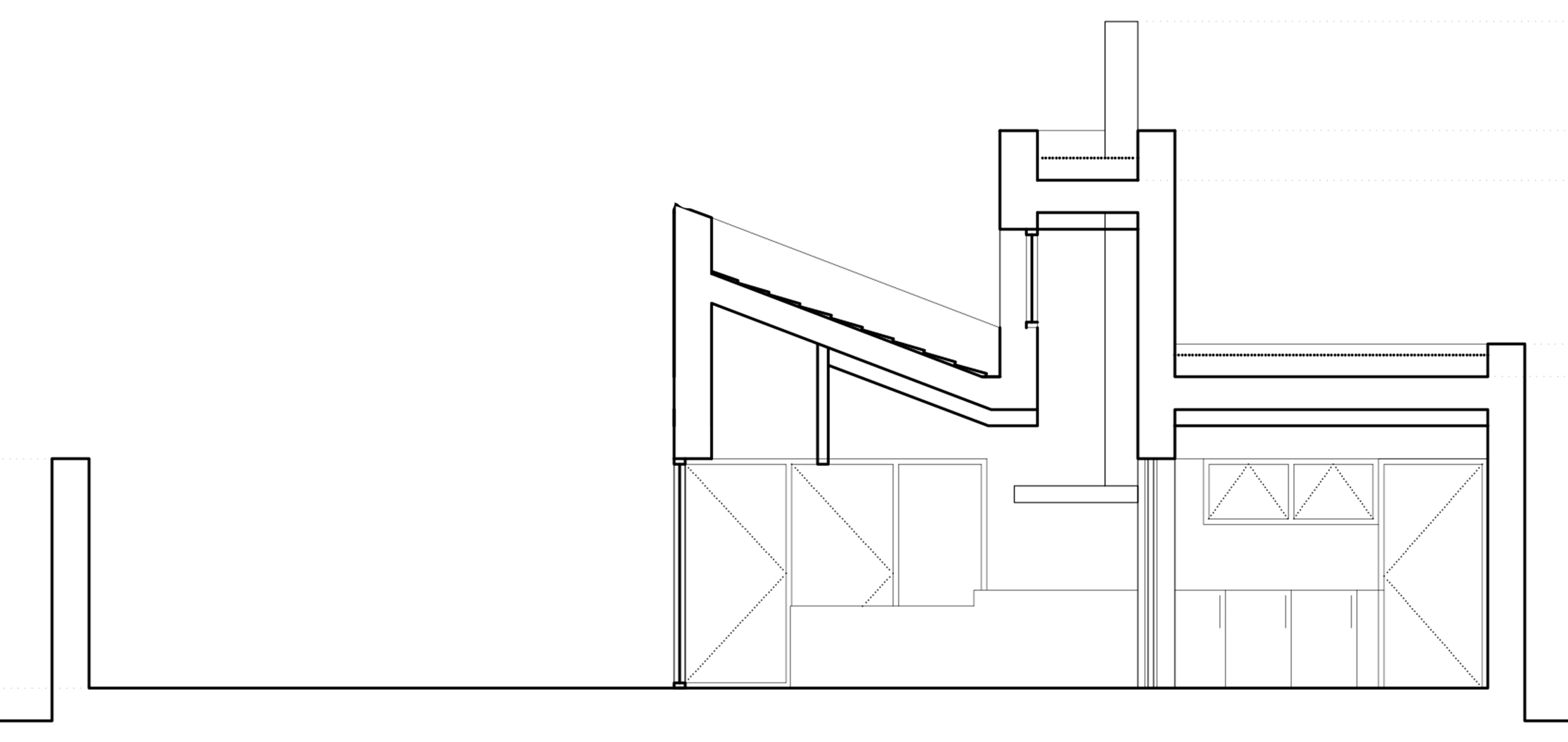 OOIIO Architecture's Casa ARM appears cut in half by a recessed entrance