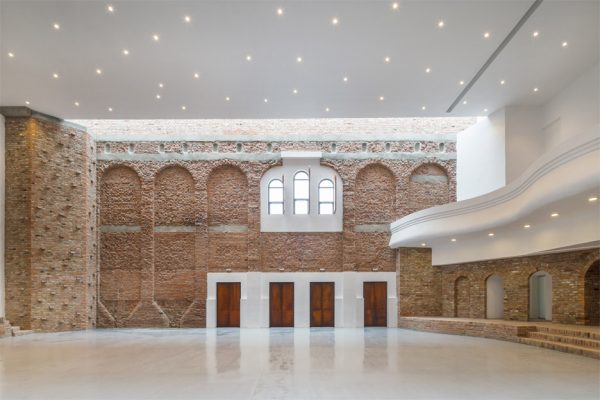 Ruined "cultural palace" in Romania revived by architect Vlad Rusu