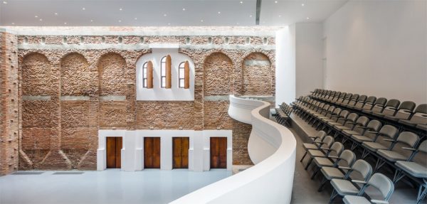 Ruined "cultural palace" in Romania revived by architect Vlad Rusu