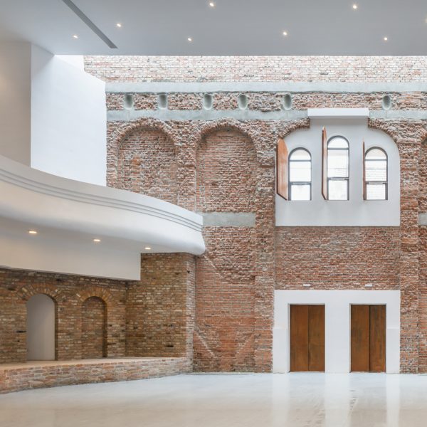 Ruined "cultural palace" in Romania revived by architect Vlad Rusu