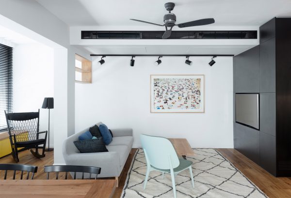 Raanan Stern arranges Tel Aviv apartment around long central corridor