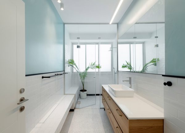 Raanan Stern arranges Tel Aviv apartment around long central corridor