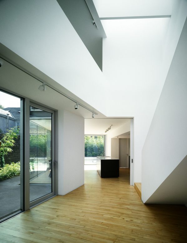 Folding House by A2 Architects cranks and folds along a narrow site
