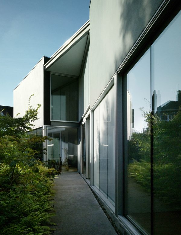 Folding House by A2 Architects cranks and folds along a narrow site
