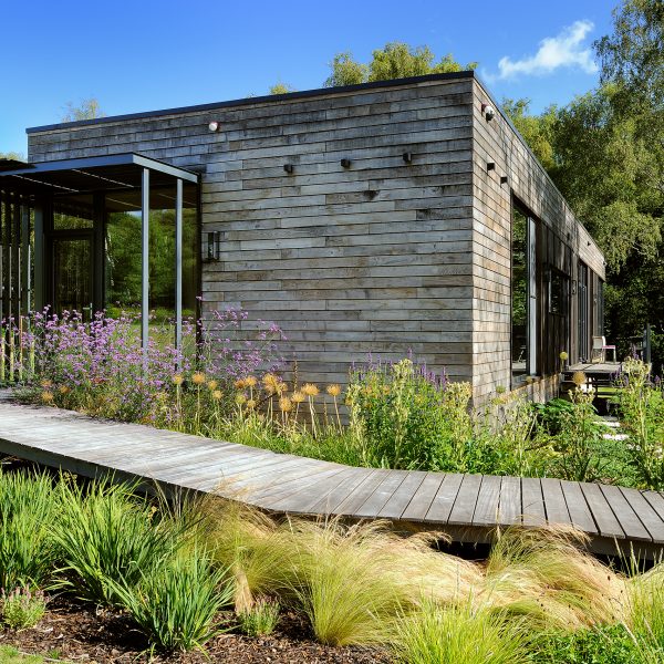 Wood-clad Forest Lodge by Pad Studio