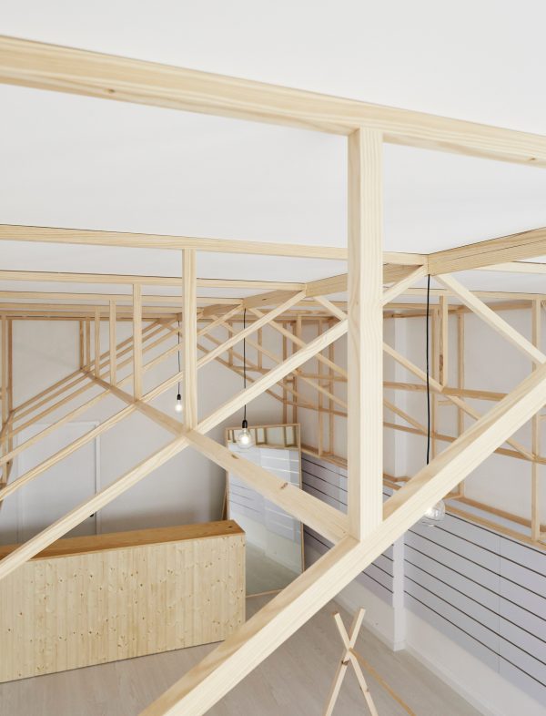 Bruno Lucas Dias adds timber skeleton to Portuguese accessories boutique