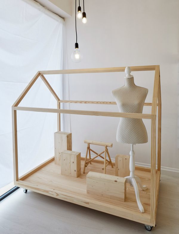 Bruno Lucas Dias adds timber skeleton to Portuguese accessories boutique