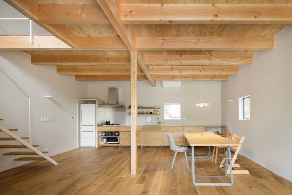 House in Mikage by Sides Core contrasts white surfaces with exposed wooden beams