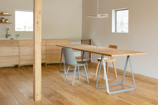 House in Mikage by Sides Core contrasts white surfaces with exposed wooden beams