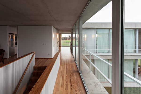 Moarqs and Ottolenghi Architects wrap Lamas House with concrete screen