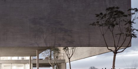 Moarqs and Ottolenghi Architects wrap Lamas House with concrete screen