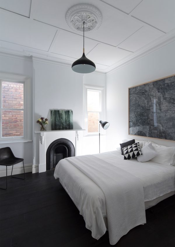Studioplusthree adds contrasting black extension to white Federation house in Sydney