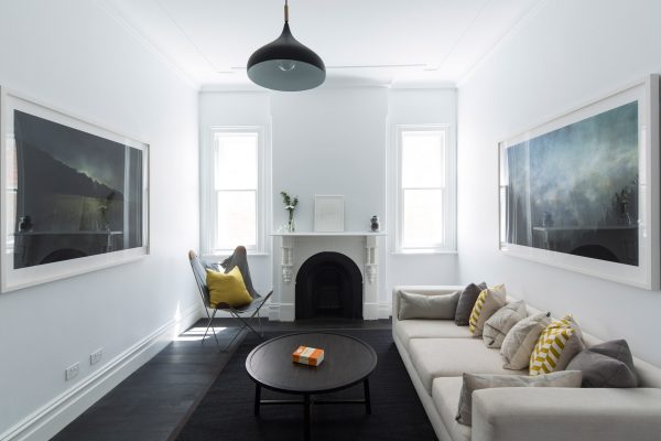 Studioplusthree adds contrasting black extension to white Federation house in Sydney