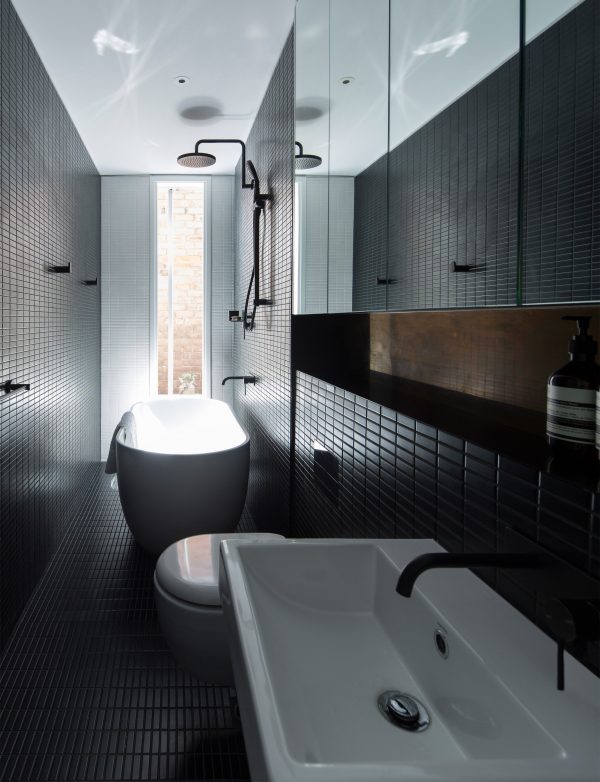Studioplusthree adds contrasting black extension to white Federation house in Sydney