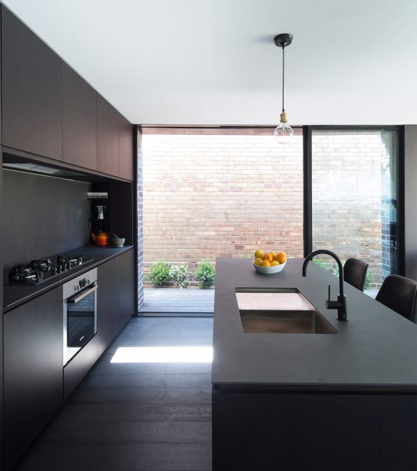 Studioplusthree adds contrasting black extension to white Federation house in Sydney