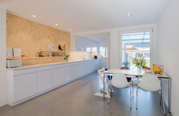 Rafael Schmid updates his Zurich home with textured chipboard and smooth anhydrite surfaces