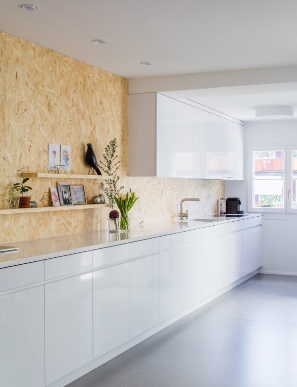 Rafael Schmid updates his Zurich home with textured chipboard and smooth anhydrite surfaces