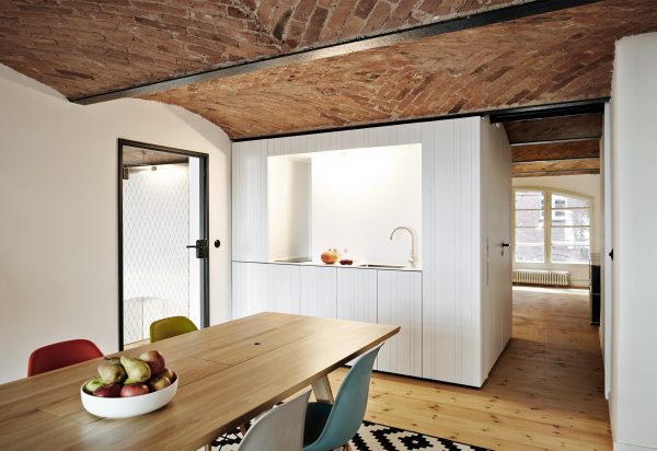 IFUB transforms former chocolate factory into office with secret storage