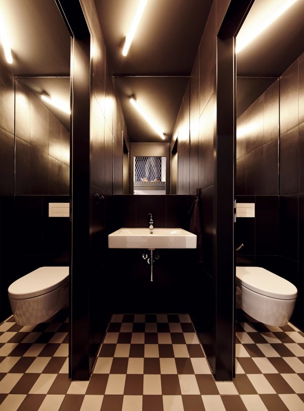 IFUB transforms former chocolate factory into office with secret storage