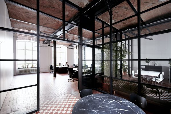 IFUB transforms former chocolate factory into office with secret storage