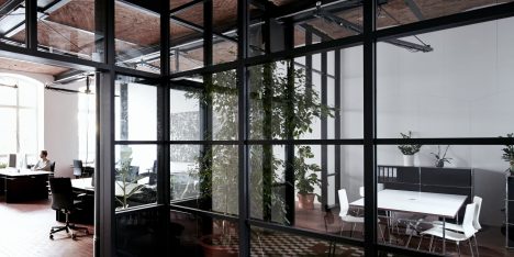 IFUB transforms former chocolate factory into office with secret storage