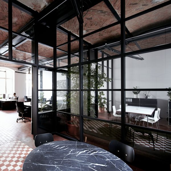IFUB transforms former chocolate factory into office with secret storage