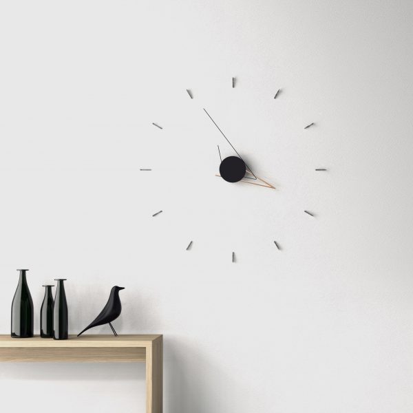 Poetic Lab's faceless Silo Clock uses lines and shadows to tell the time