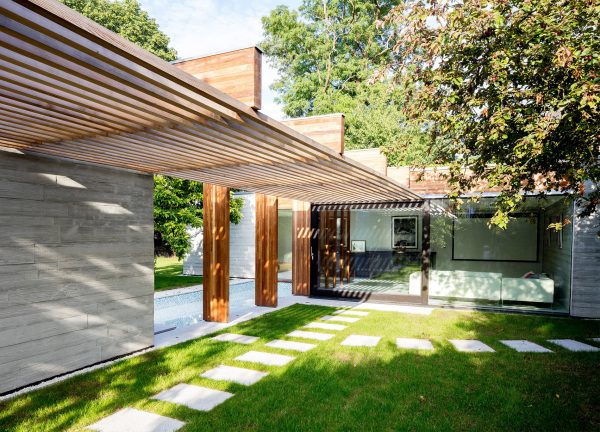 McGarry-Moon Architects adds concrete, timber and glass extension to a traditional gatehouse