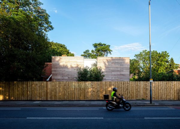 McGarry-Moon Architects adds concrete, timber and glass extension to a traditional gatehouse