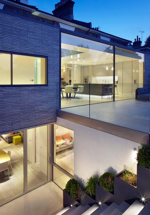 Studio Octopi adds glass-fronted extension to White Lodge house in London