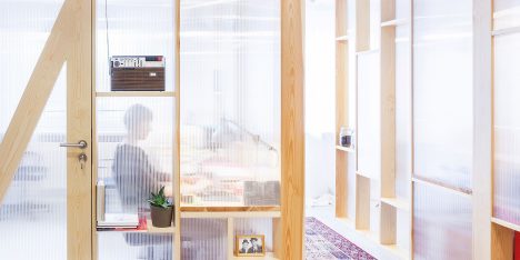 MFRMGR creates semi-transparent cubicles for sound production office in Warsaw
