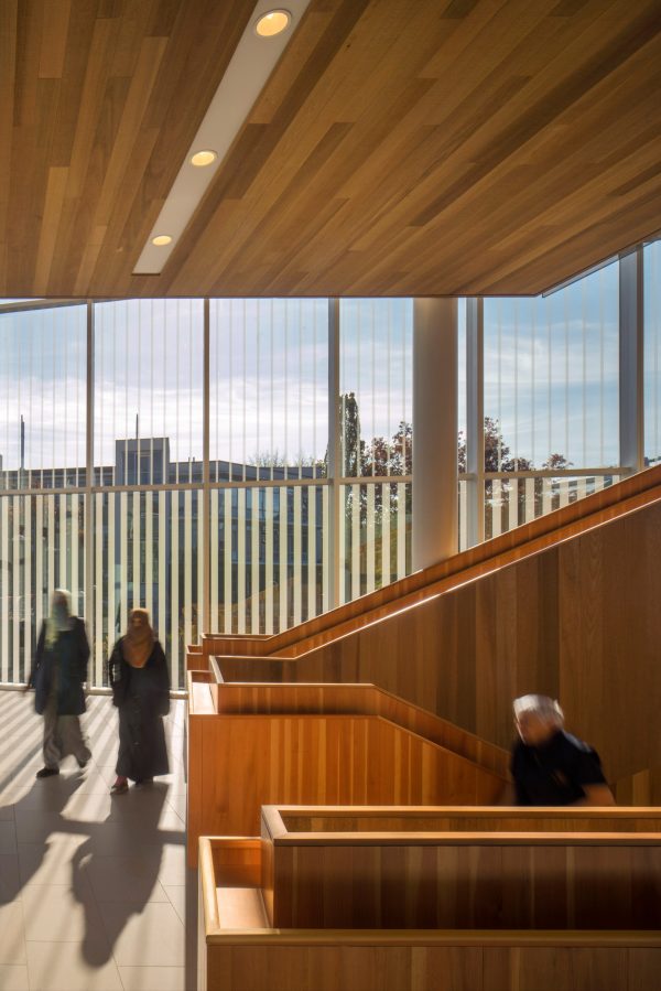 Vancouver university building by KPMB features fritted glass and rough-sawn cedar