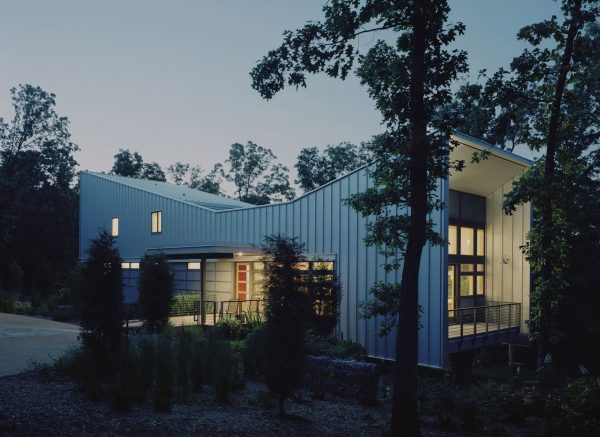 Bowtie House by deMx Architecture has an angular metal roof