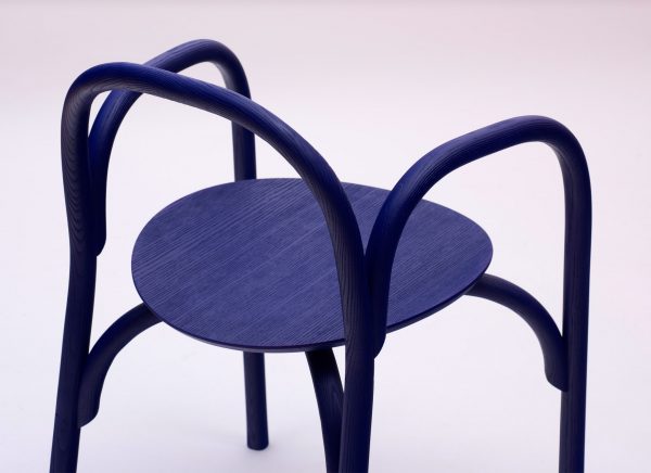 Samuel Wilkinson creates minimal chair using steam-bent wood chair
