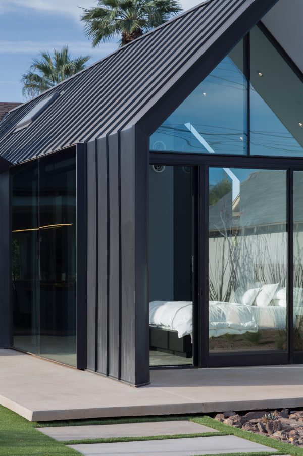 Chen + Suchart creates a gabled addition clad in metal for an historic Arizona home