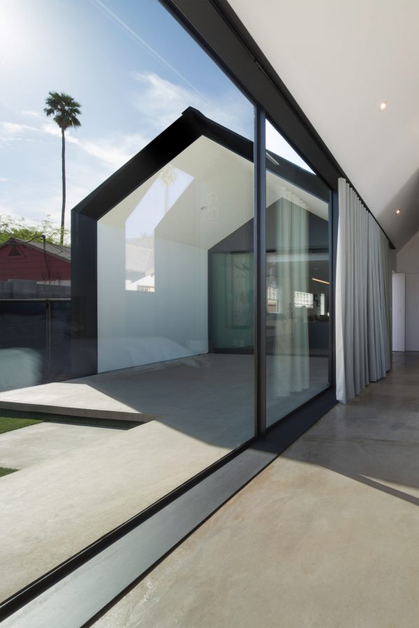 Chen + Suchart creates a gabled addition clad in metal for an historic Arizona home