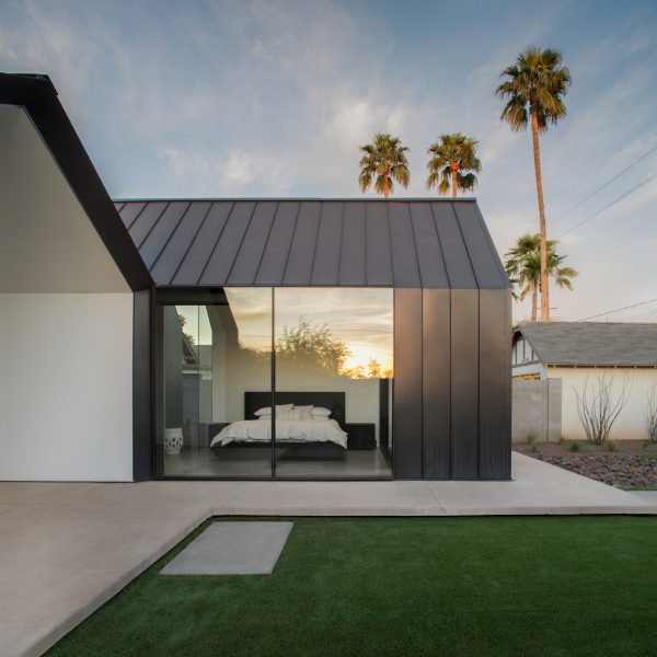 Chen + Suchart creates a gabled addition clad in metal for an historic Arizona home