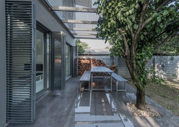 Iranian holiday home by RooyDaad Architects is black on the outside and white on the inside