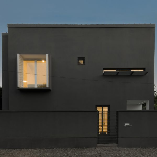 Iranian holiday home by RooyDaad Architects is black on the outside and white on the inside