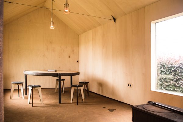 Moving walls open Stal Collectief's charred timber workshop to the elements