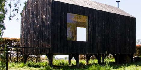 Moving walls open Stal Collectief's charred timber workshop to the elements