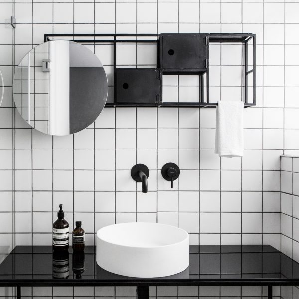 Minimal Tel Aviv apartment features bespoke gridded shelving