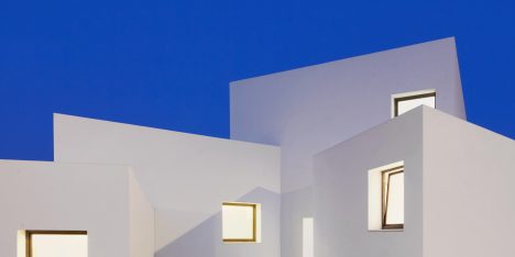 Four angular white volumes form house in Mallorca by OHLAB