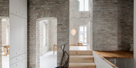 Asdfg Architekten converts former miller’s house into contemporary home