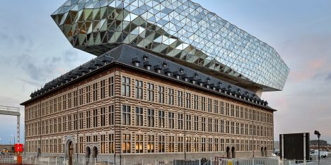 Zaha Hadid Architects sits rippling glass lump on top of Antwerp port building