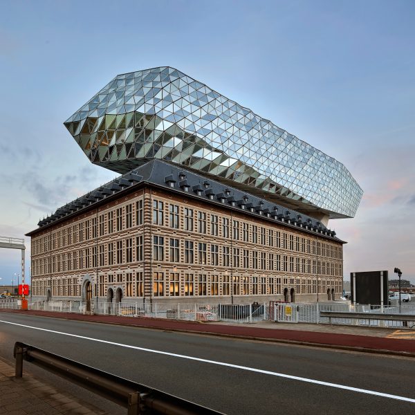 Zaha Hadid Architects sits rippling glass lump on top of Antwerp port building