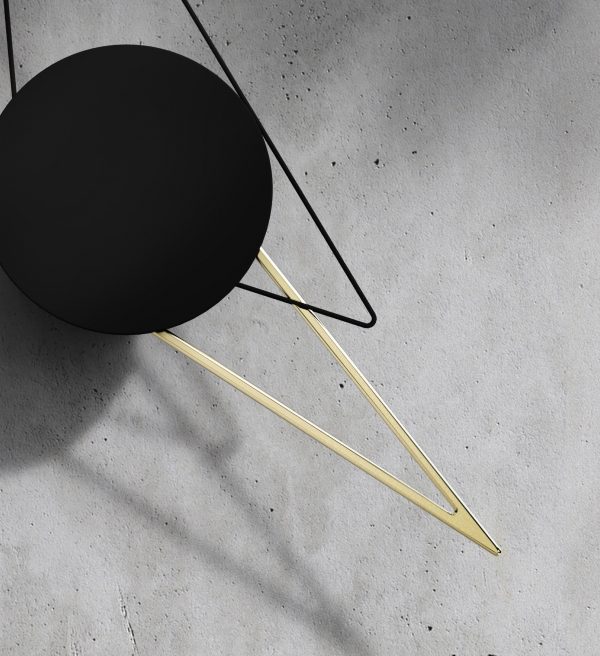 Poetic Lab's faceless Silo Clock uses lines and shadows to tell the time