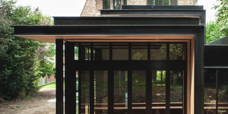 Steel and glass extension added to traditional stone house in Paris by Atelier Lame